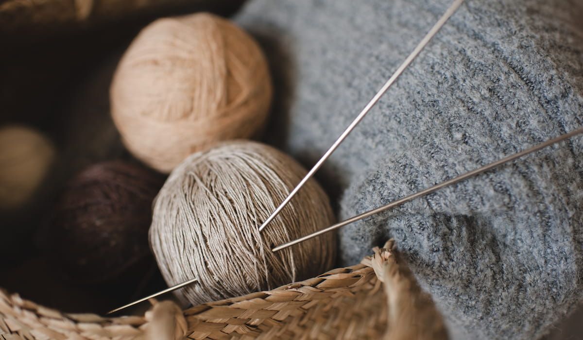 Skein of yarn with knitting needles