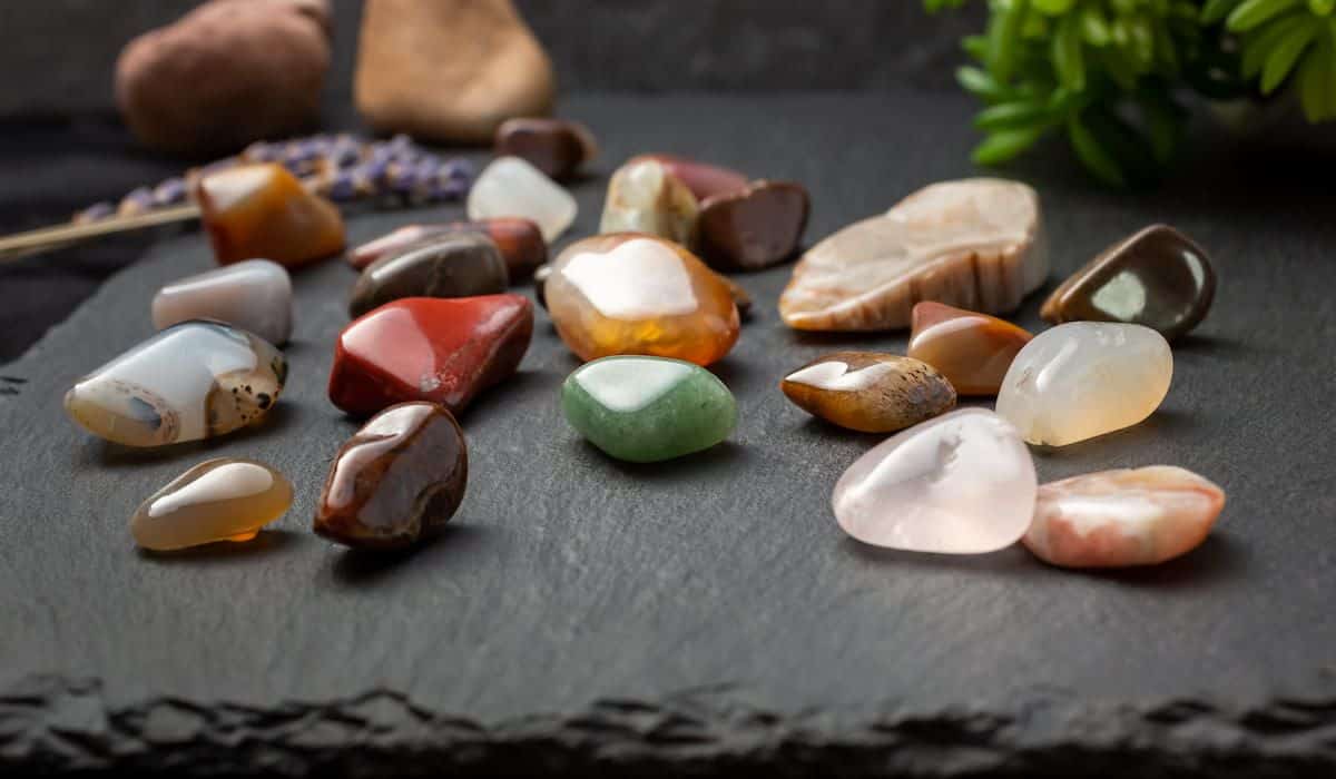 a collection of smooth tumbled pebbles and stones