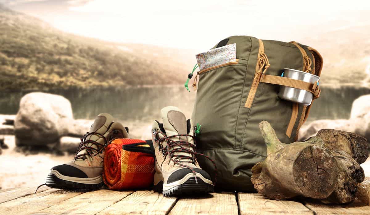 backpacking gear on lakeside port
