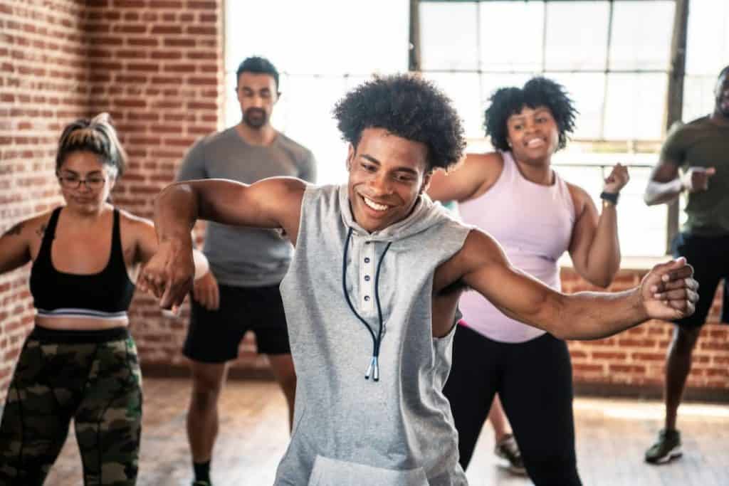 group of people dancing while having fun