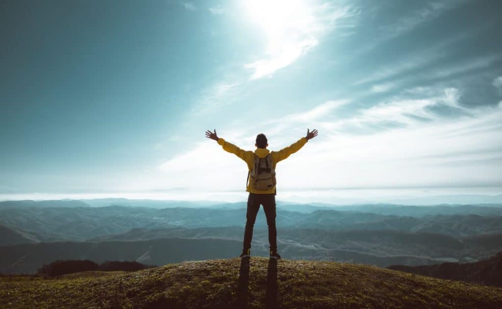 hiker on top of a mountainside