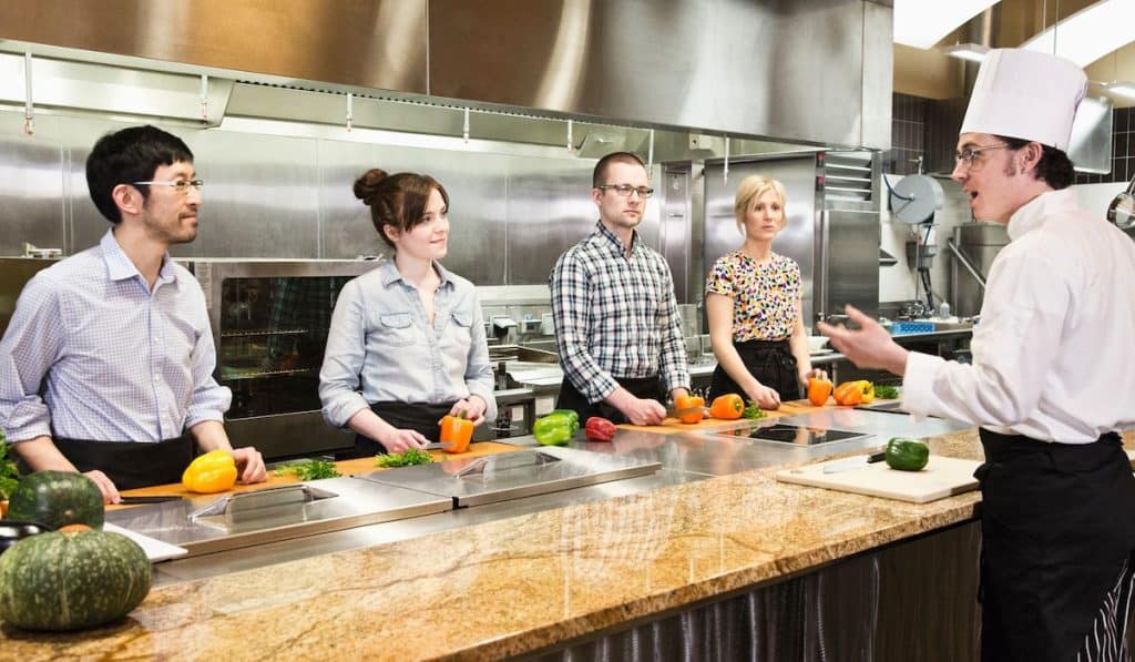 male chef teaching a cooking class