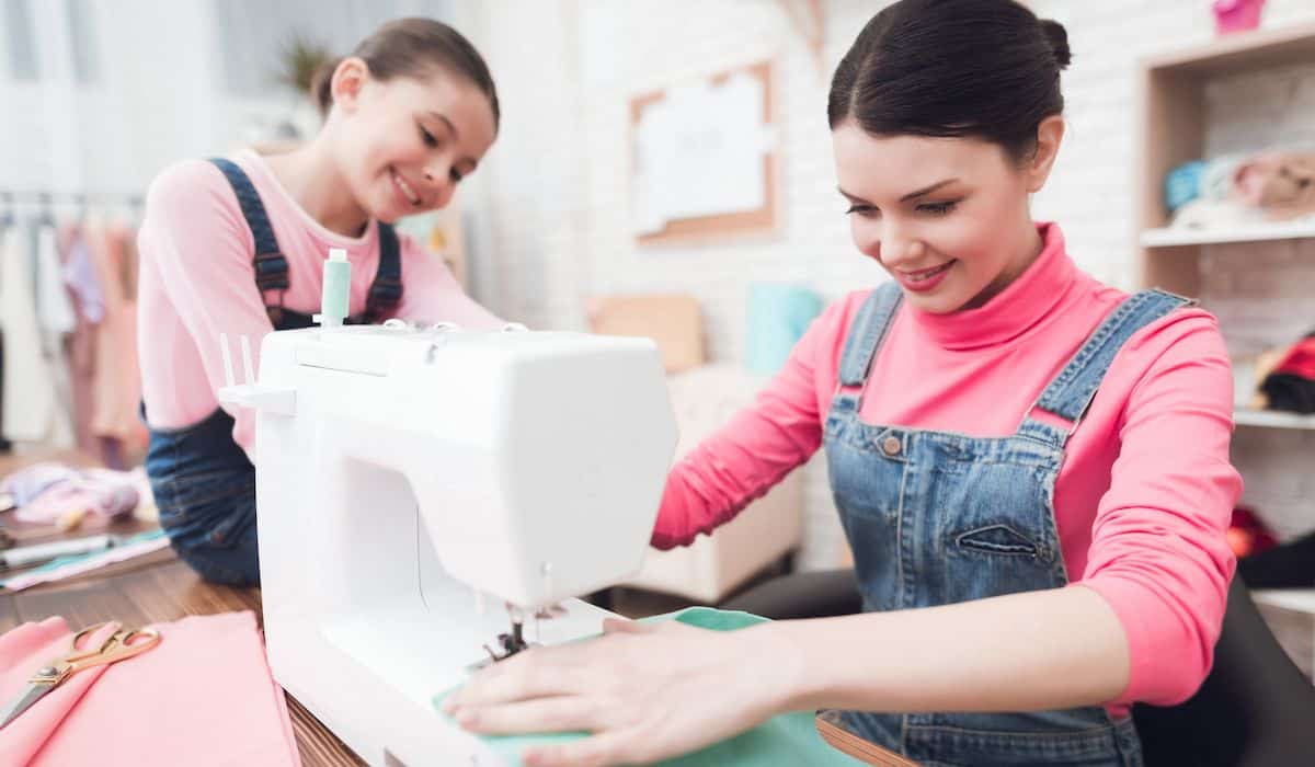 mom and daughter sewing