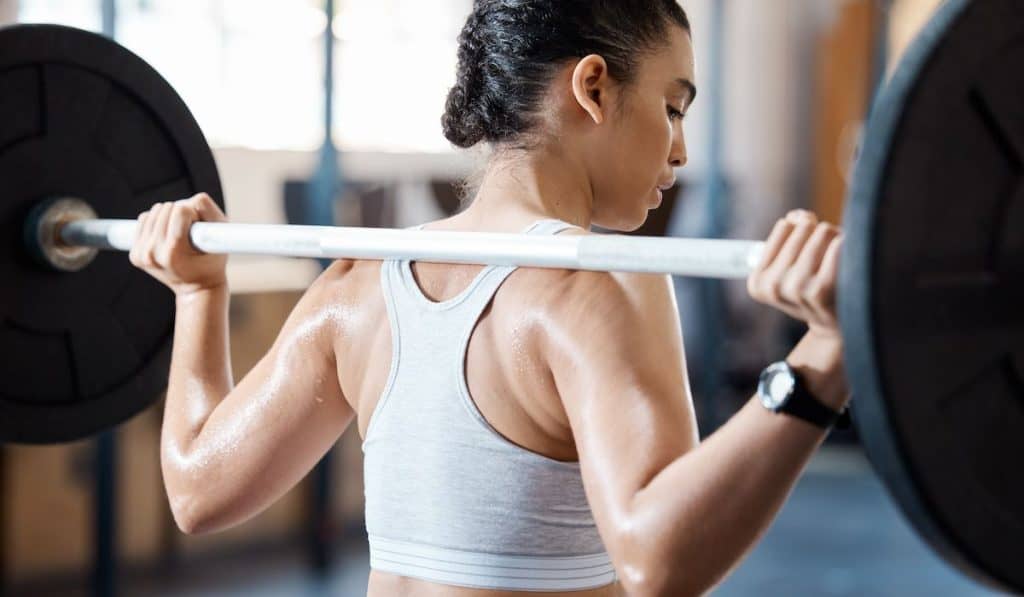 woman doing weight lifting