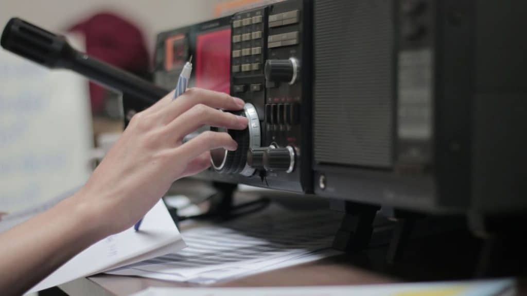 young man operating ham radio