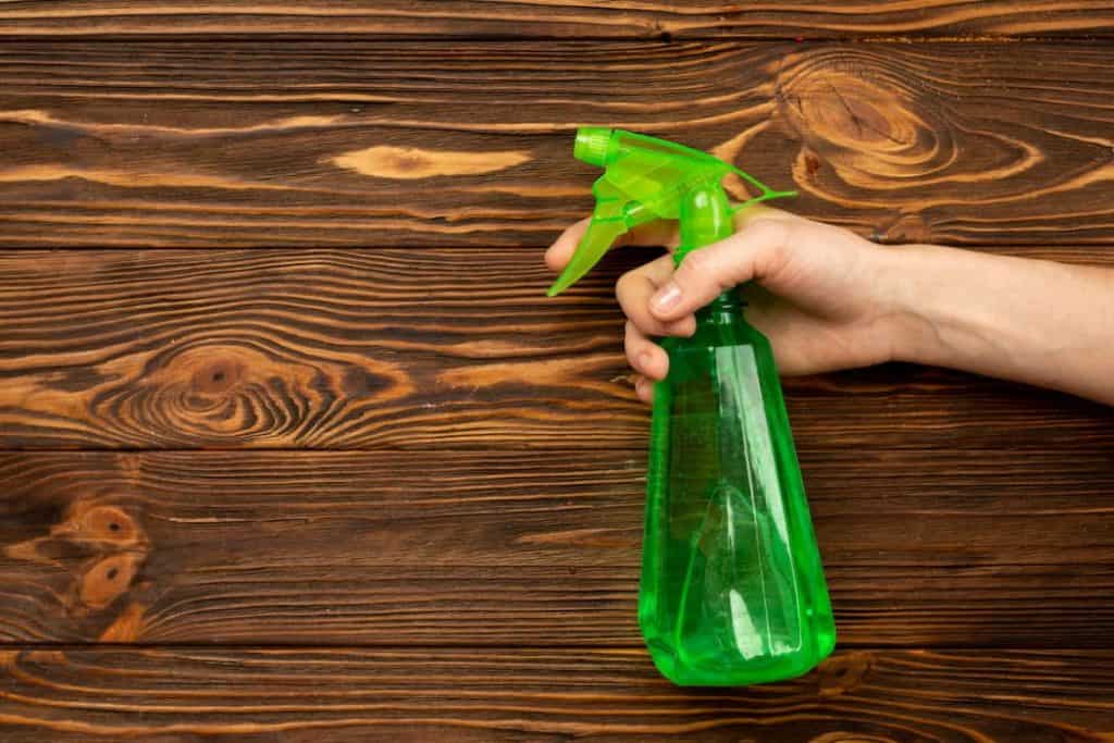 green transparent water bottle pray