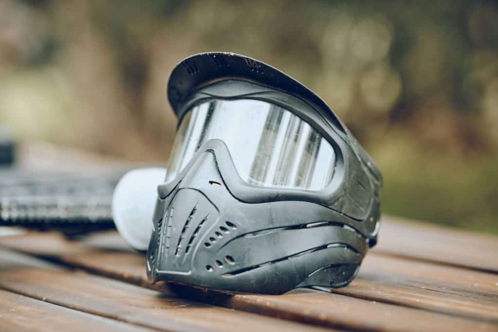 paintball helmet on a wooden platform 