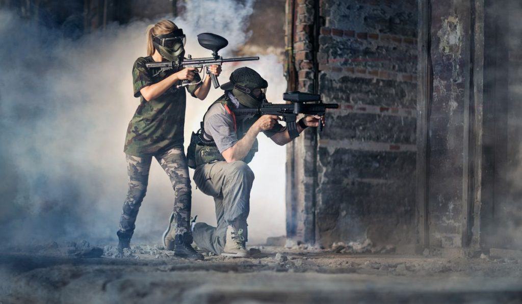 paintball couple defending an area