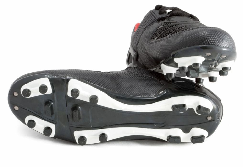 Pair of black cleats shoes