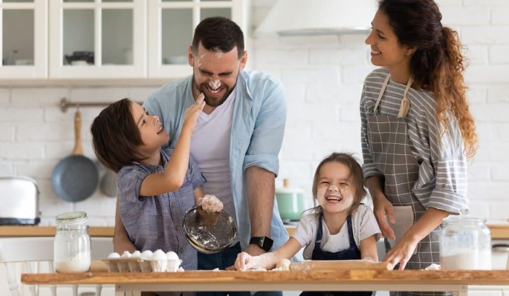 a family happily baking