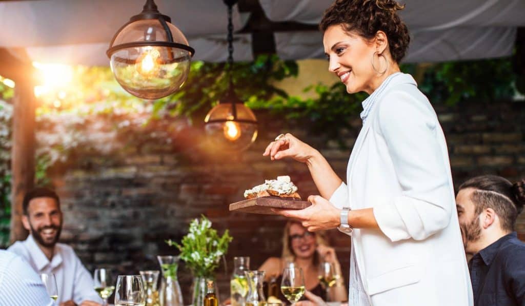 a female guest hosting a small party