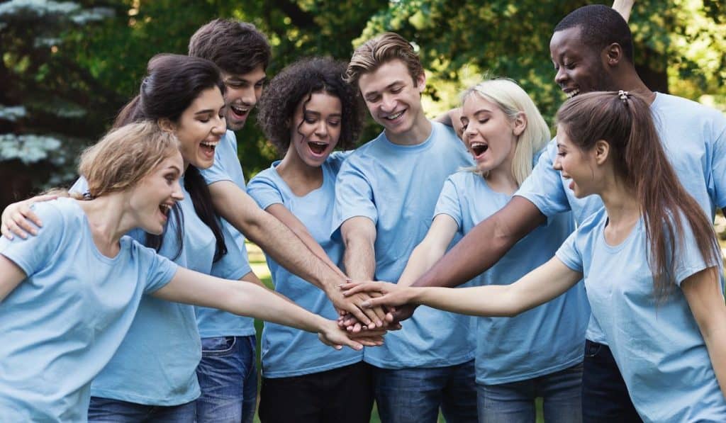 a group of volunteers teaming up