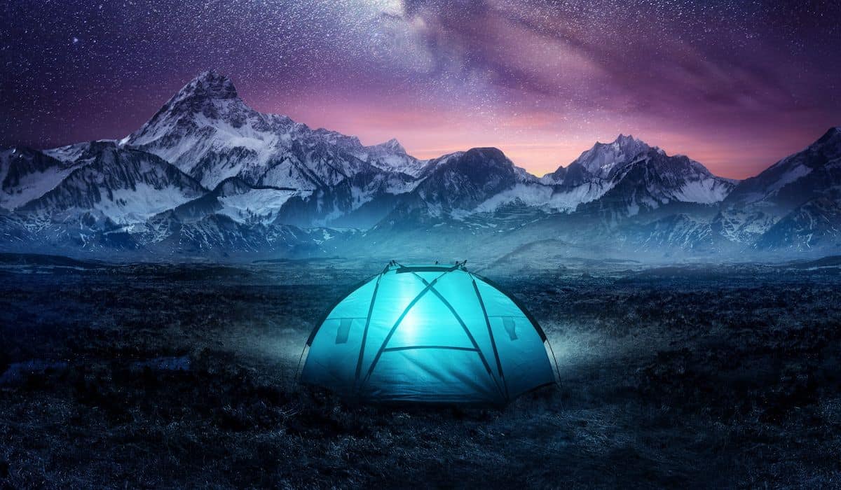 a tent in the open at night