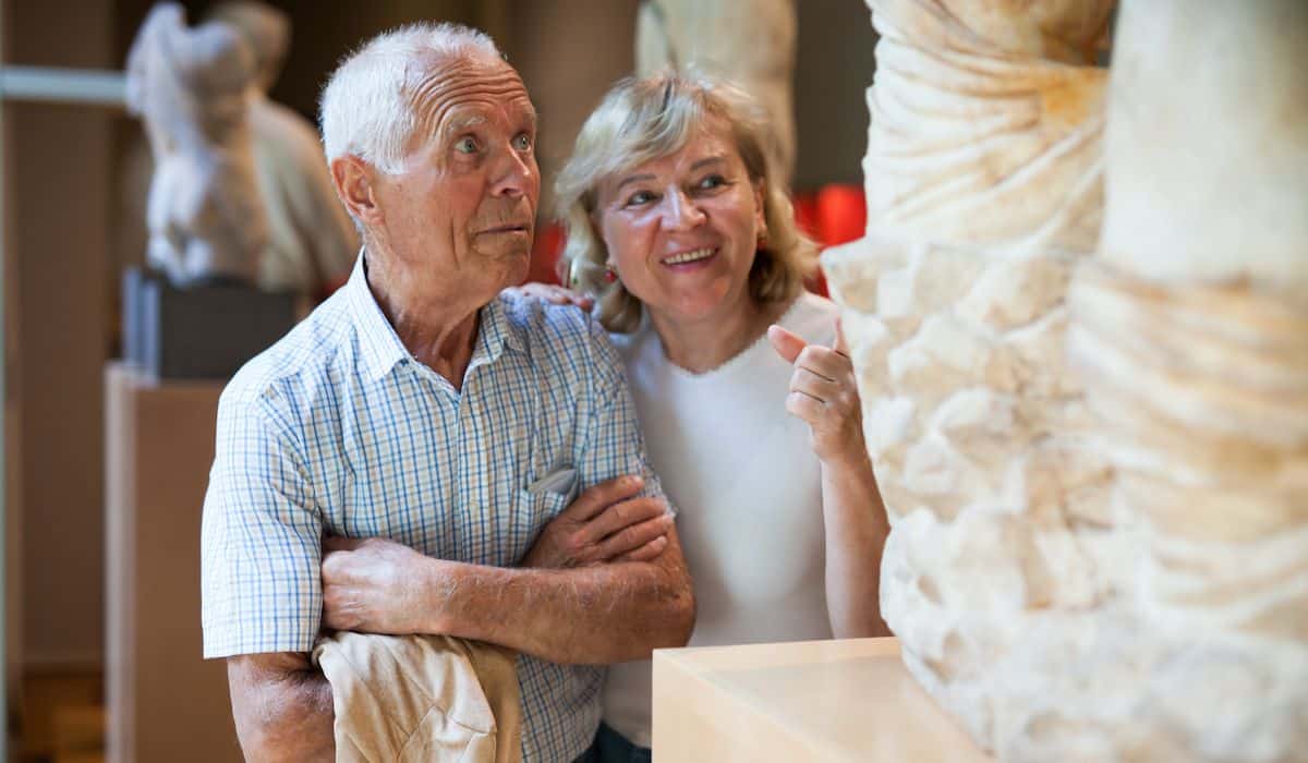 senior couple inside a museum