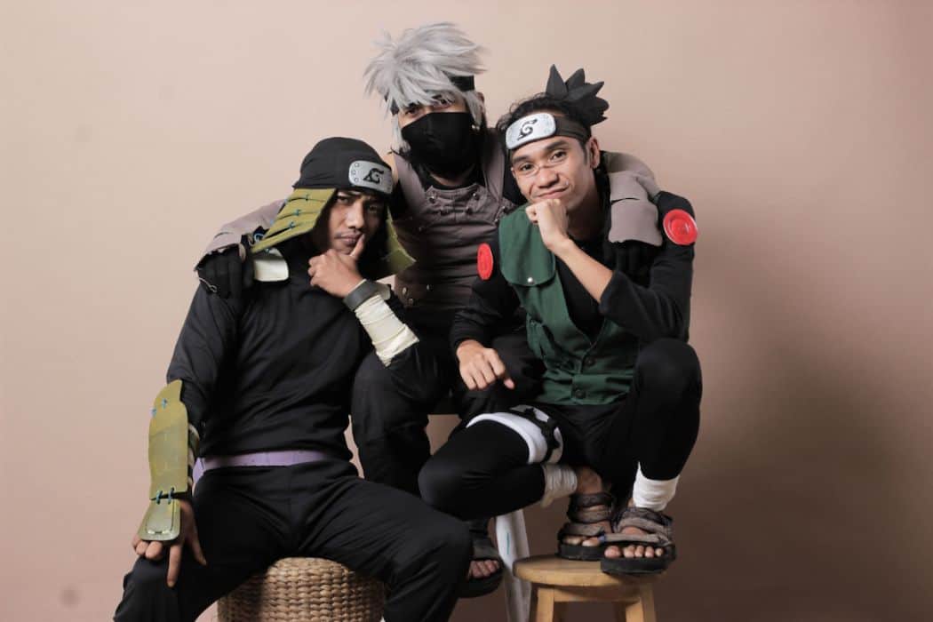 three members of the Hokage Santuy cosplaying as shinobi characters in the Naruto anime