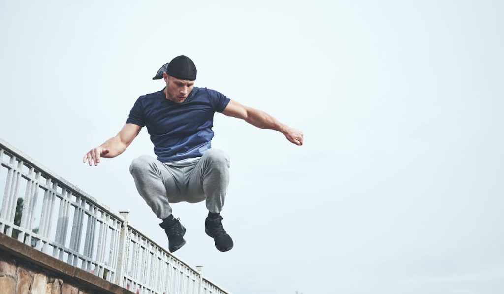 man doing parkour in the city