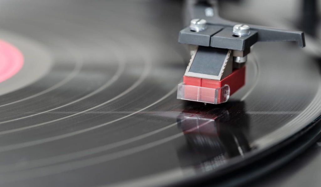 playing a vinyl record 