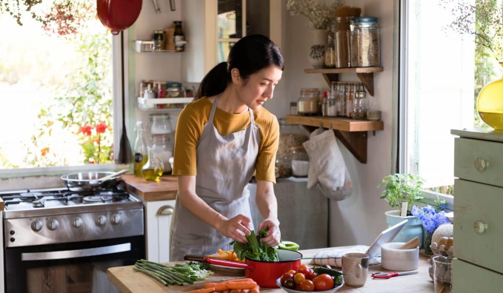 woman busy cooking in the kitchen 