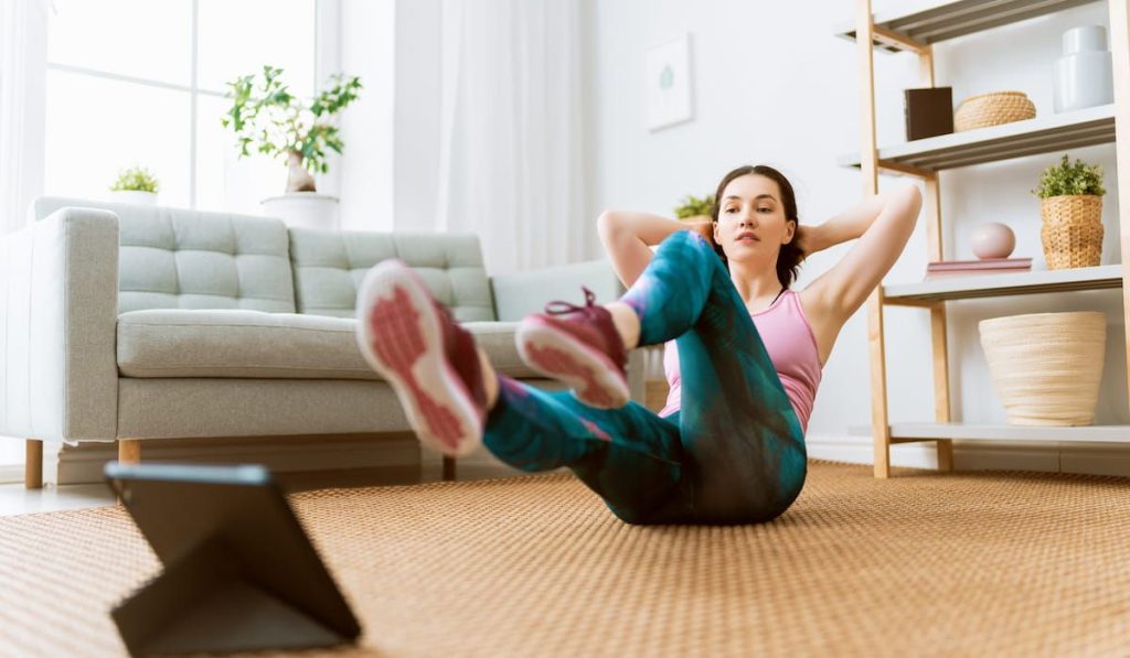 woman doing exercises at home 