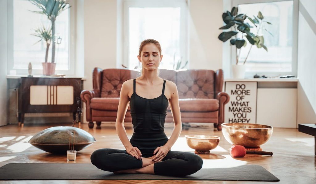 woman doing yoga at home 