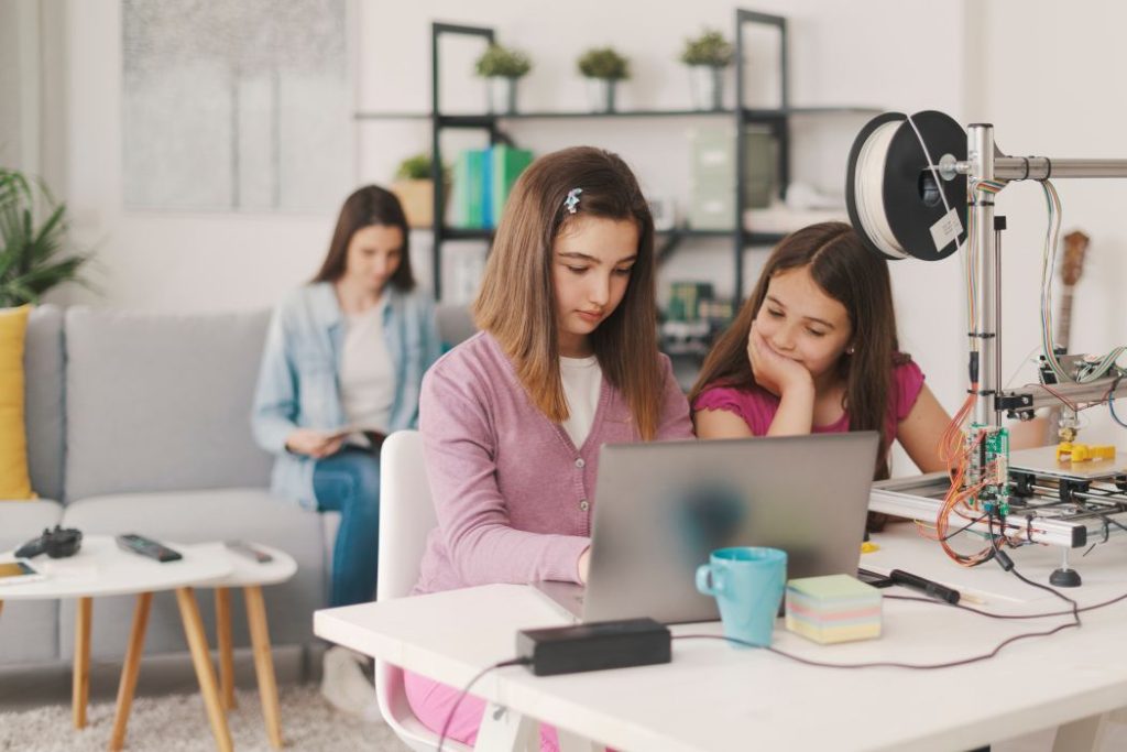 Children learning 3D printing at home 