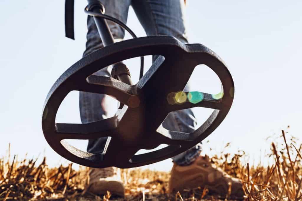 Man with metal detector equipment 