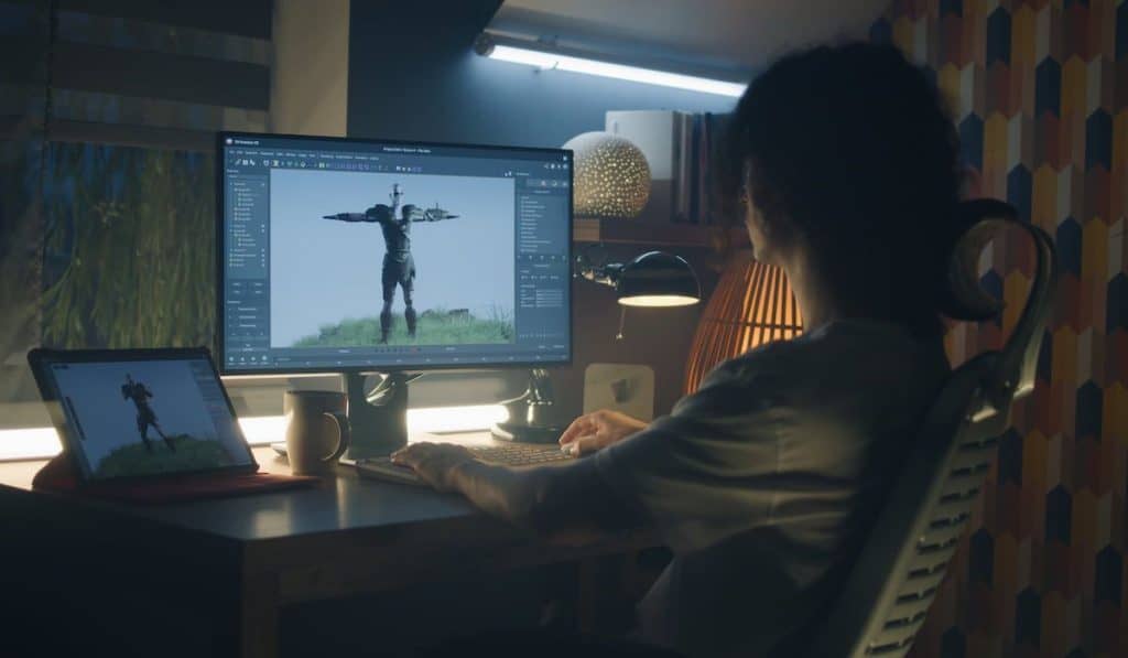 a young man making animation for video game character