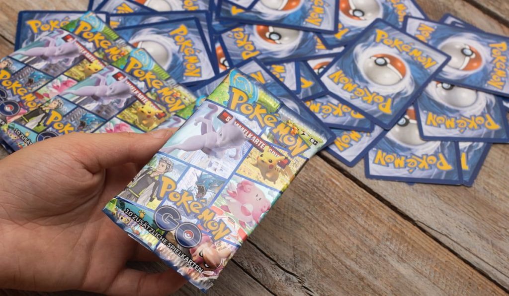 boy collecting pokemon cards