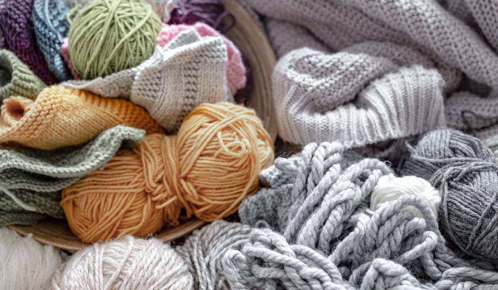 yarn for knitting in pastel and bright colors 