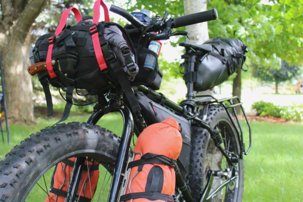 Fat bike loaded with bags and gear ready for expedition camping trip