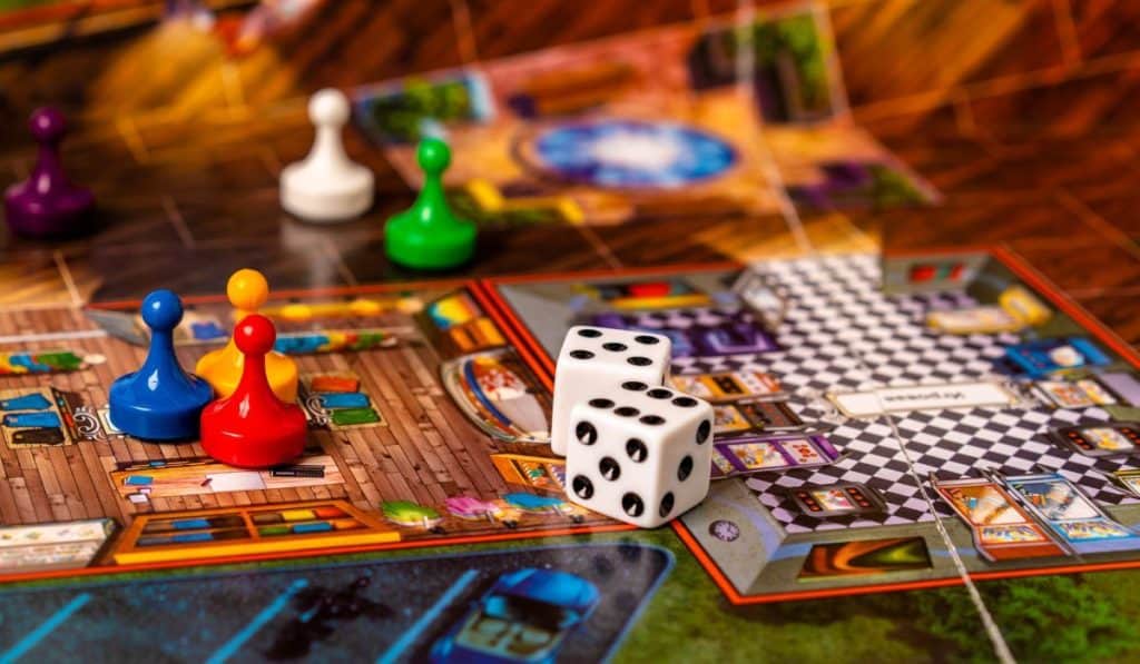 Cluedo board game, chips and cubes on the playing field