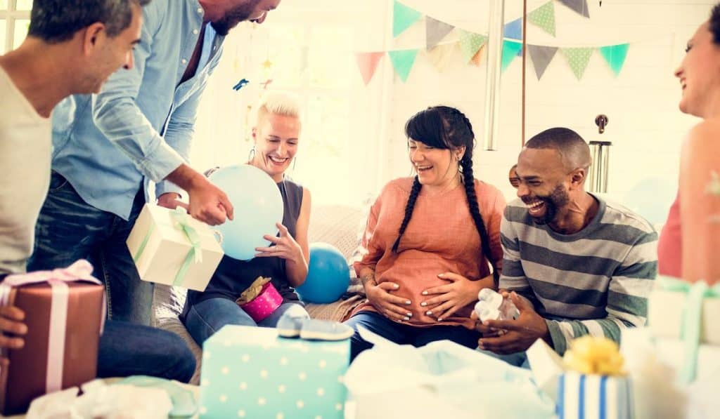 Group of friends enjoying at baby shower party