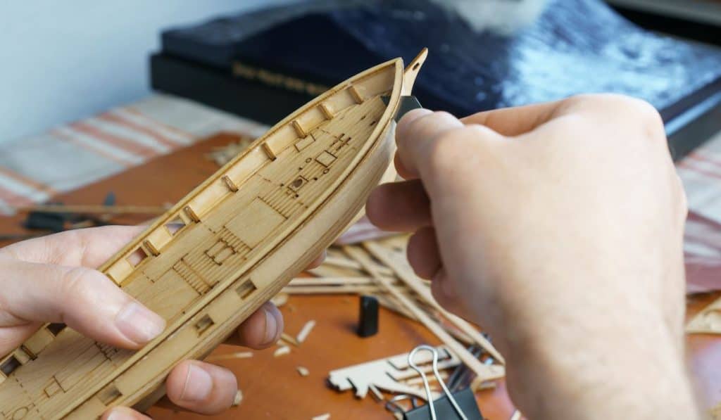 Process of building toy ship, hobby and handicraft