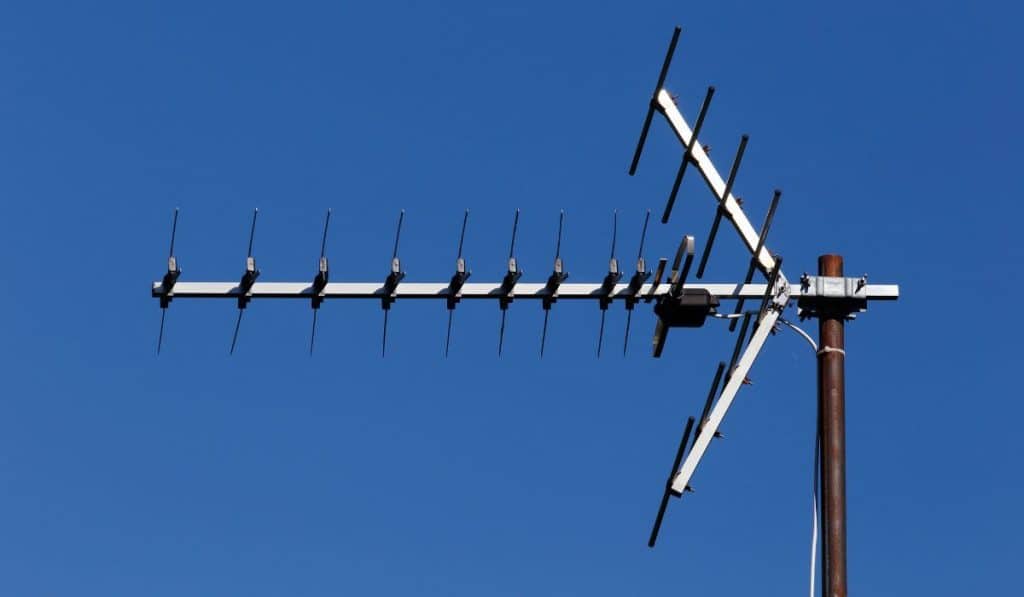 TV antenna for receiving terrestrial television UHF band against the blue sky