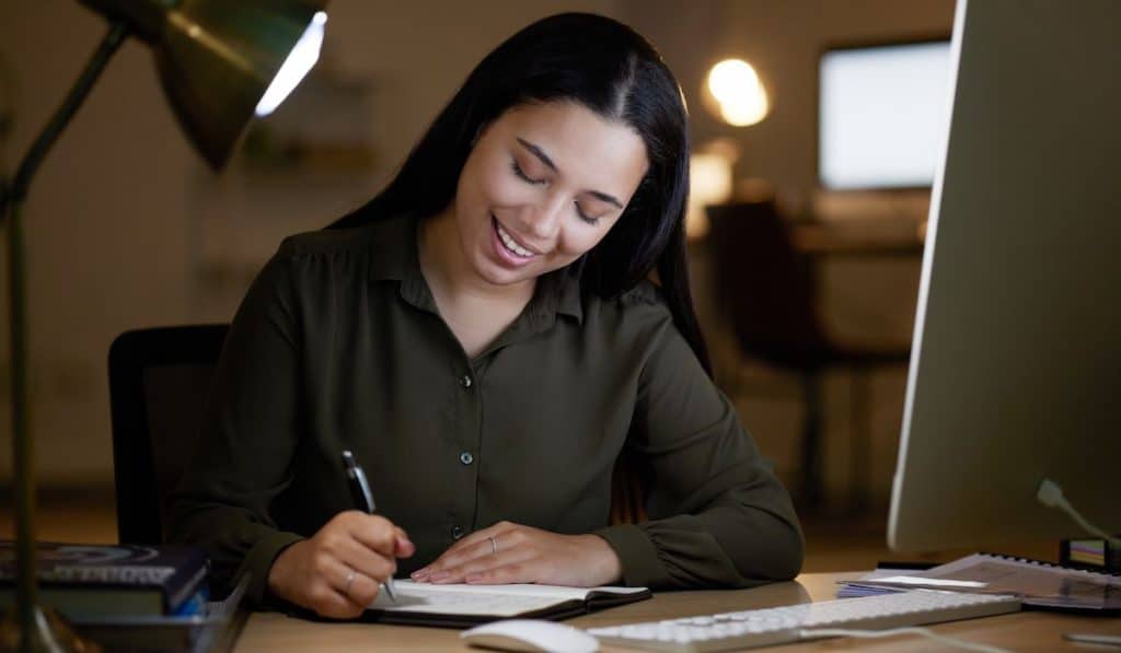 business woman with notebook for investment calendar, trading research 