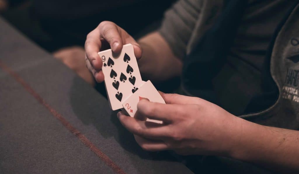 Arranging cards on dark background