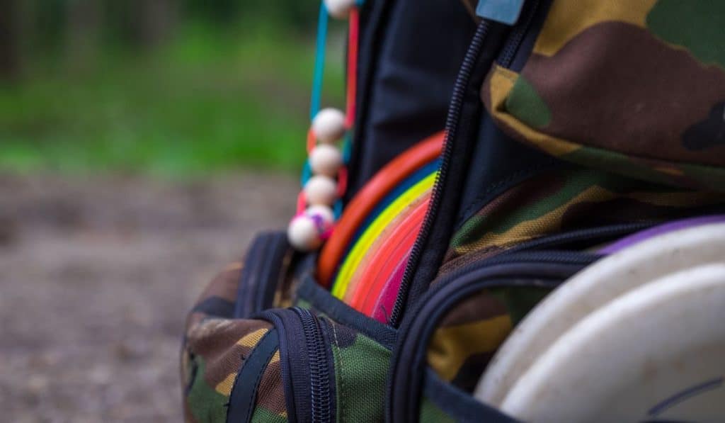 Disc golf bag full of color discs
