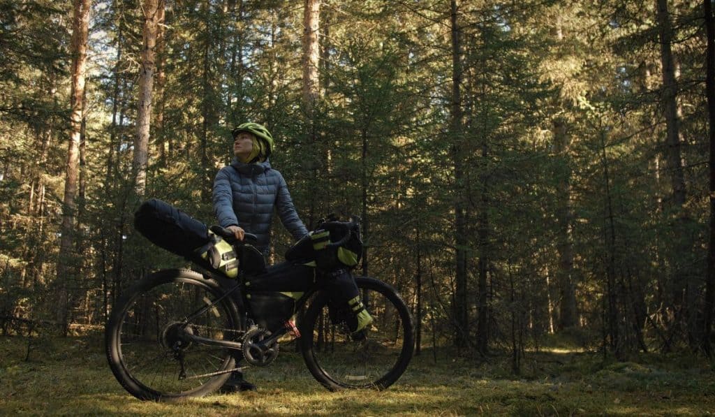 woman travel on mixed terrain cycle